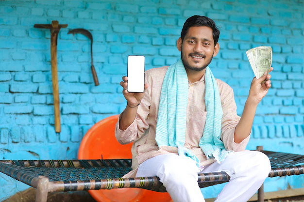 indian-farmer-showing-smartphone-money-home_75648-7371 indian-farmer-showing-smartphone-money-home_75648-7371
